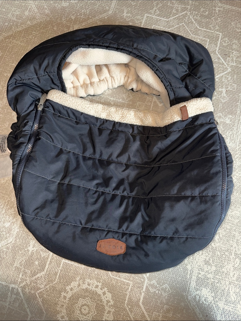 JJ Cole Black Quilted Baby Carry Footmuff with Cream Sherpa Lining